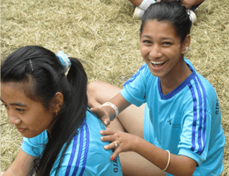 Girls doing Story Massage Programme in a field