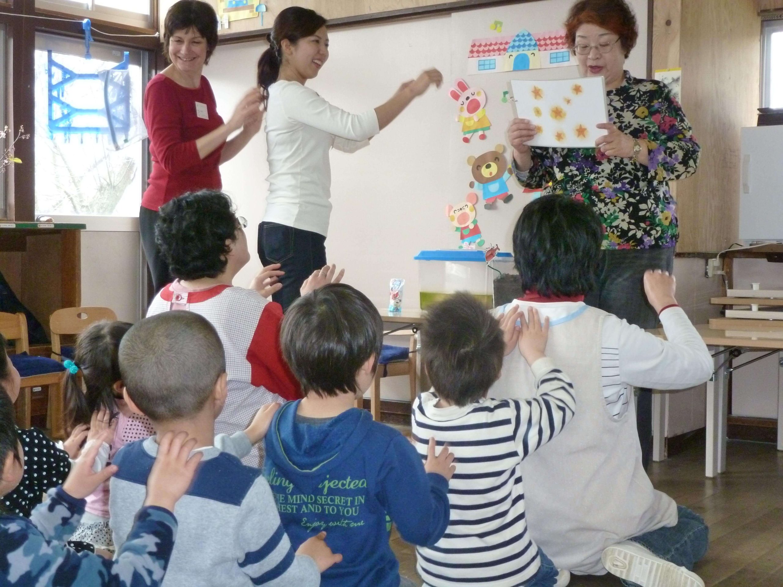 Mary doing a demo in Japan of Story Massage Programme